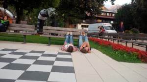 He has not got the hang of this hugging business. 